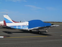 G-BLVL @ EGMD - wrapped up against wind - by magnaman