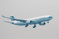 B-HLN @ VHHH - On finals for Hong Kong, inbound from Kuala Lumpur Int'l - by alanh