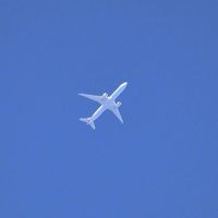 N729AN @ EGFH - American Airlines B773 Eastbound at 29000 feet. Note lack of jet trails. - by Roger Winser