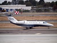 N32PM @ KSNA - Cessna 525C taxing for take off. - by Eric Olsen