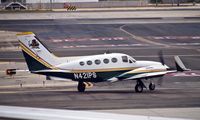 N421PS @ KSNA - Cessna 421C taxing  for takeoff. - by Eric Olsen
