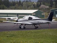 N5EV @ 0S9 - SR22T on the ramp at 0S9 - by Eric Olsen