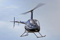 G-MDKD @ EGFH - R22 BETA, Heli-Air Swansea based, seen on a lesson. - by Derek Flewin