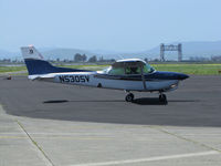 N5305V @ KAPC - American Academy of Aeronautics 1980 Cessna 172RG taxis in @ Napa County Airport, CA with the iconic Napa River RR Bridge in background. - by Steve Nation