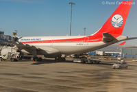 B-6518 @ CYVR - In international wing, from a departing plane. - by Remi Farvacque