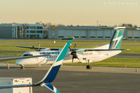 C-GWEQ @ CYVR - Parked on tarmac near domestic terminal. - by Remi Farvacque