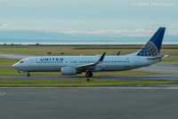 N27239 @ CYVR - Taxiing for take-off, south runway. - by Remi Farvacque