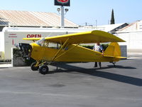 N3042M @ SZP - Wyoming Services LLC (Cheyenne, WY) banner towing 1947 Piper PA-12 with cowling removed @ Santa Paula Municipal Airport