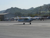 N704JH @ SZP - 1976 Cessna 150M, Continental O-200 100 Hp, landing roll Rwy - by Doug Robertson