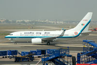 K5012 @ VIDP - 'Rajdoot' taxiing past the cluttered apron at IGIA T-1. - by Arjun Sarup