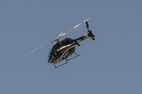 N429XT - Flying over Bristol Motor Speedway on the weekend of the April 17th Food City 500 NASCAR race.
