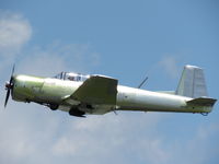 N91333 @ KDTN - Departing runway 32 - by Carl Hennigan