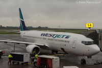 C-FPLS @ CYVR - Docked at domestic. - by Remi Farvacque