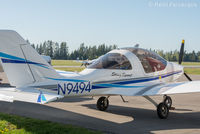 N9494 @ KAWO - Parked at a hanger at north end of airport.