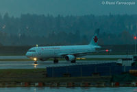 C-GJWN @ CYVR - Taxiing to domestic after landing westerly on north runway. - by Remi Farvacque