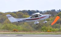 N464MA @ EGFH - Resident Cessna Skylane departing Runway 28. - by Roger Winser