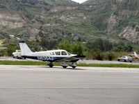N6364J @ SZP - 1968 Piper PA-28-180 CHEROKEE, Lycoming O&VO-360 180 Hp, landing roll Rwy 22 - by Doug Robertson