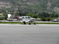 N1965Z @ SZP - 1965 Beech S35 BONANZA, Continental IO-520-B 285 Hp, landing roll Rwy 22 - by Doug Robertson