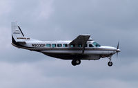 N903DP @ KBFI - Cessna 208B over Boeing Field. - by Eric Olsen