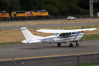 N92120 @ KBFI - Cessna 182M taxing by Boeing Field. - by Eric Olsen