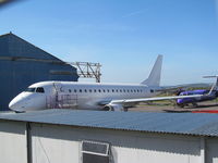 EI-FNB @ EGTE - Not sure what the new identity of this airframe is - reggie now taped over in black! - by magnaman