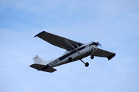 N9893Q @ KBFI - Cessna 172M over Boeing Field. - by Eric Olsen