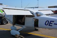 OE-DJW @ LOWG - Preparing the plane - by Paul H