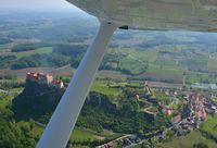 OE-DJW @ LOWG - Flying over castle Riegersburg in Styria, Austria - by Paul H