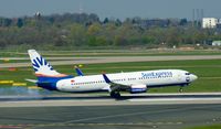 TC-SNN @ EDDL - Sun Express, is here burning some rubber while landing at Düsseldorf Int'l(EDDL) - by A. Gendorf