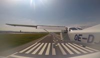 OE-DJW @ LOWG - Landing on Rwy 17C at LOWG - by Paul H