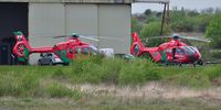 G-HEMN @ EGFH - Visiting Wales Air Ambulance helicopter as the Childrens Air Ambulance for Wales with the resident Wales Air Ambulance helicopter G-WASN. - by Roger Winser