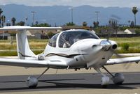 N858DT @ KRHV - California-based Diamond Star 40 all started up and ready for taxi out and departure at Reid Hillview Airport, San Jose, CA. - by Chris Leipelt
