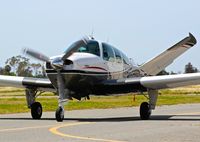 N950CA @ KRHV - Locally-based 1974 Beechcraft V35B Bonanza taxing in at Reid Hillview Airport, San Jose, CA. - by Chris Leipelt