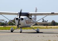 N2129C @ KRHV - Locally-based 2003 Cessna 172S taxing out for departure at Reid Hillview Airport, San Jose, CA. - by Chris Leipelt