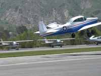 N91689 @ SZP - 1946 North American NAVION, Continental E225 Upgrade, takeoff climb Rwy 22, Young Eagles flight-with apologies my bad panning - by Doug Robertson