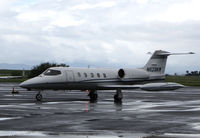 N623KM @ KAPC - Quarry Lane LLC (Chatsworth, CA) 1980 Gates Learjet 35A  arriving from KSJC @ a rainy Napa County Airport, CA - by Steve Nation