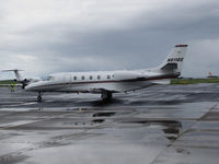 N611QS @ KAPC - NetJets 2005 Cessna 560XL Citation Excel arriving from KLAS in the rain @  Napa County Airport, CA - by Steve Nation
