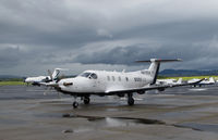 N819SA @ KAPC - SURF AIR 2014 Pilatus PC-12/47E arriving from KHHR @ rainy Napa County Airport, CA - by Steve Nation
