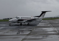 N60WC @ KAPC - West Coast Charters 1993 Beech B300 arriving from Southern California @ rainy Napa County Airport, CA - by Steve Nation