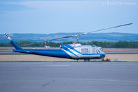 C-FHQT @ CYXJ - Fighting our forest fires. Parked on apron opposite control tower. - by Remi Farvacque