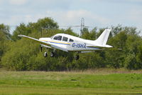 G-ISHA @ EGCB - Piper PA-28-161 Landing at Manchester City Airport. - by David Burrell