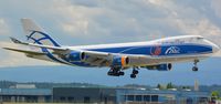 VQ-BHE @ LOWG - Air Bridge Cargo, ABC Boeing 747-4KZF seconds before touchdown at LOWG - by Paul H