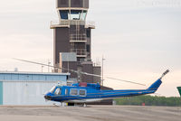 C-FXUQ @ CYXJ - Parked by control tower. Fighting forest fires during the day. - by Remi Farvacque