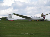 G-DHCX - At North Hill awaiting next tow - by magnaman