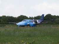 N899AG @ EGTU - nice colours on this - one of 3 - B99 skydive a/c based here - by magnaman