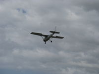 N704UT @ SZP - 1976 Cessna 150M, Continental O-200 100 Hp, on final Rwy 22, doing pattern work - by Doug Robertson