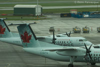 C-FMDW @ CYVR - Parked at domestic - by Remi Farvacque