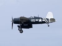 N72NW @ KPAE - FG-1D over Paine Field during GA day. - by Eric Olsen