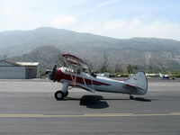 N32135 @ SZP - 1941 Waco UPF-7, Continental W670 220 Hp radial, a stunning show plane SZP-hangared, taxi to Rwy 22 - by Doug Robertson