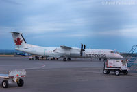C-GGOK @ CYXJ - Freshly arrived in  front of main terminal - by Remi Farvacque